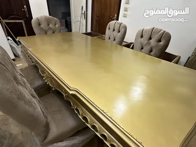 غرفة سفرة لقطة جديدة ترابيزة و 6 كراسي لم تستعمل خشب زان قماش قطيفة لون كافيه والاسفنج مضغوط و جديد