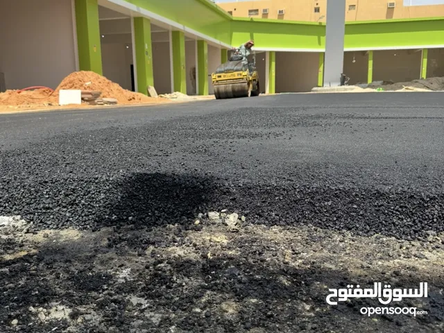 مقاول الأسفلت ومبشور