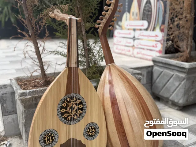 عود عندليب جديد مع حقيبه وريشه صناعه مصرية