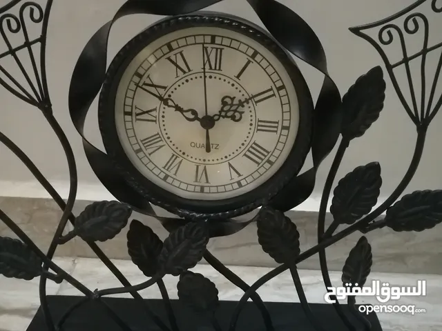 ساعه انتيكا جالس