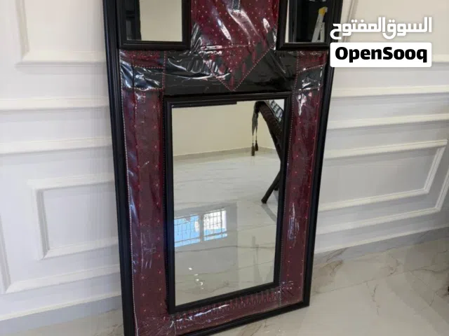 مرآة مطرزة