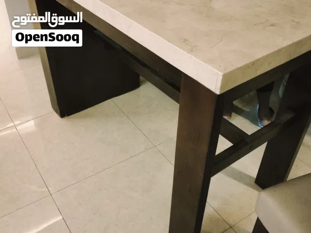 marble and wooden Dinning table with 4 chairs excellent condition