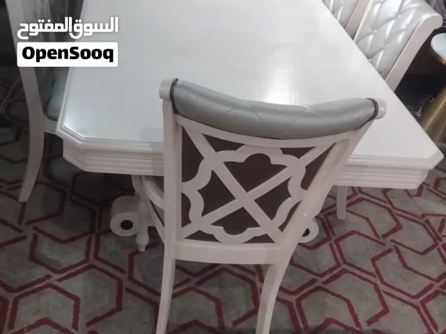 I am selling used daning tebal with 12 chairs