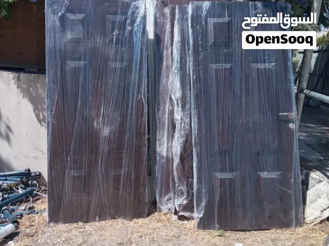 أبواب خشب مستعملة من خشب البلوط والمقنو والزان والسويد لدا محلات الحوراني يوجد 100باب أشكال وموديلات