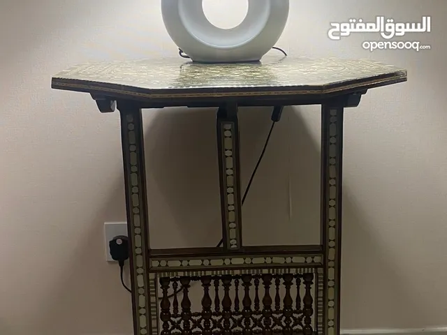 Handmade wooden table with pearl inlay