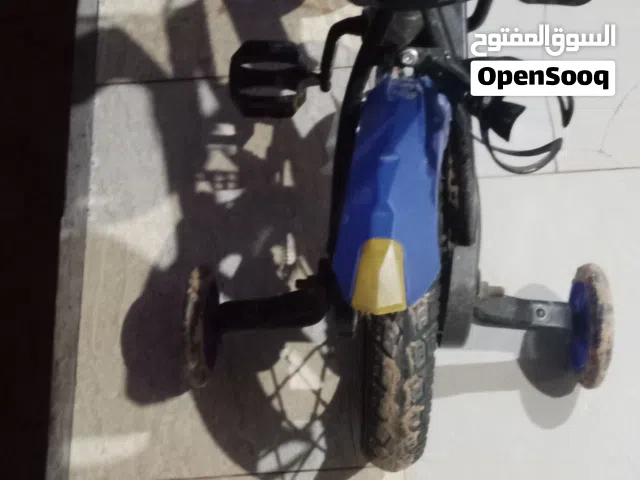 دراجة أطفال شبه جديدة استعمال بسيط جداً رقم 12واخدها بي 250