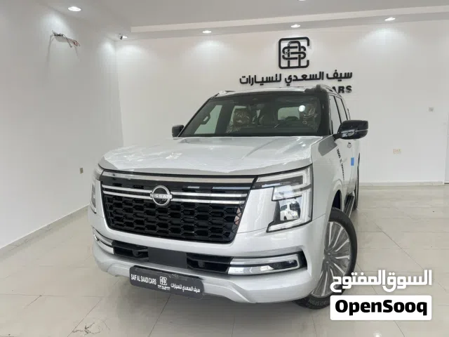 نيسان باترول بلاتينيوم فل مواصفات 2026 فضي سقف اسود على زيرو
