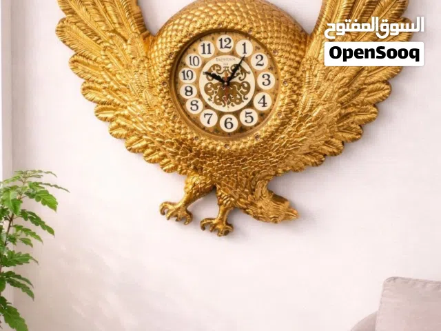 ساعة جدارية فخمة بشكل نسر ملكي
