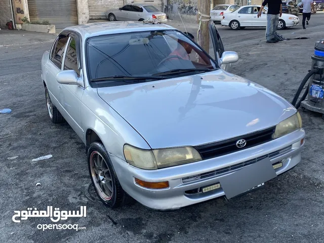 تويوتا كورولا 97 بحاله ممتازه مرخصه ومامنه سنه