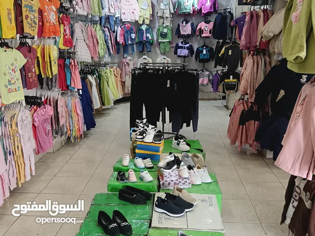 محل ألبسة ستاتي وولادي