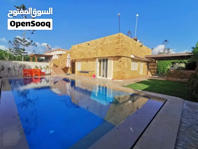 فيلا بحمام سباحة خاص بقرية جامعة القاهرة الكيلو 44 بالساحل الشمالى