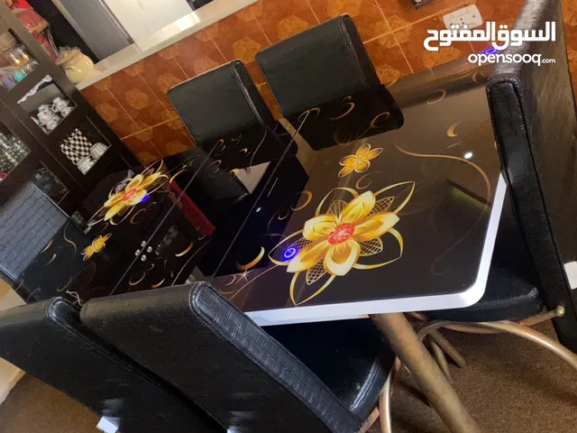 طاوله سفره للبيع غير مستخدمه فقط للديكور
