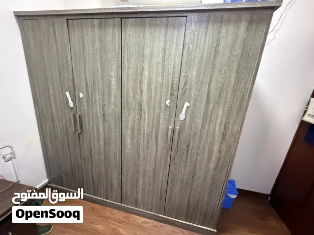 Urgent selling -Cupboard 4 door with multiple spaces inside