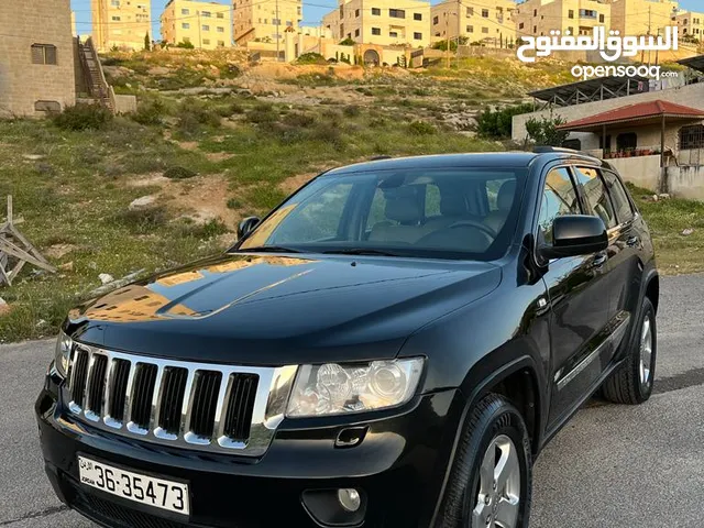 جيب شيروكي 2012 ليمتد عداد قليل فحص كامل فل كامل عدا الفتحه وارد شركه ابو خضر كاش او اقساط