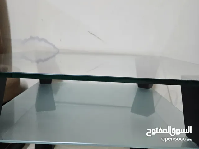 2 glass tables