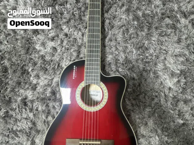 Freeman Cutaway Acoustic Guitar – Red Sunburst (6-String)  قيتار فريمان اكوستيك ،6 اوتار ،خمري
