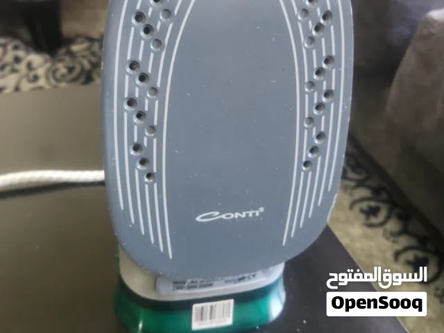 مكواة جديدة.