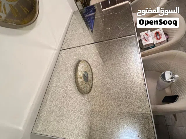 طاولة سفرة زجاج و ارجل ستانلس ذهبية  220x110 cm مع 6 كراسي