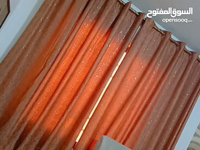 برداية مكونة من قطعتين لون بني استعمال بسيط