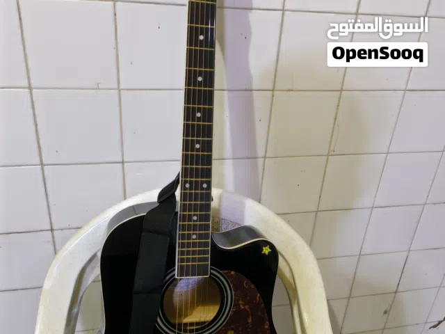 Accoustic Guitar (new) with bag + string+ strap+ pick+ tunar+ Capo