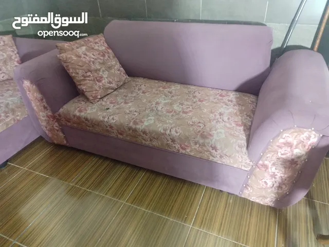 غرفة جلوس لون زهري