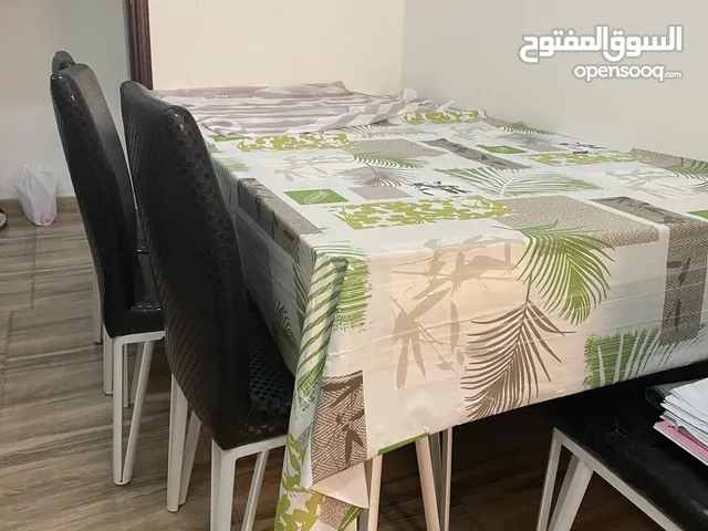 A full set of dinning table with 8 chairs