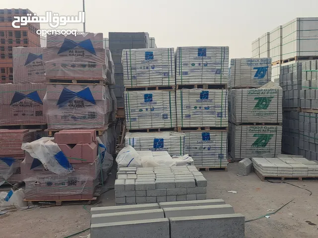 مبسط توريد مواد بناء رمل سمنت بلك بلاط بندوره انترلوك عتب برميل عازل بسكوت قواعد