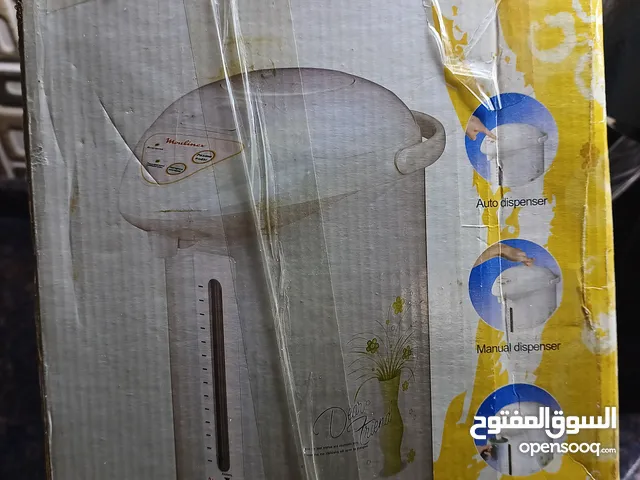 ماكنة قهوه وسخان مياه