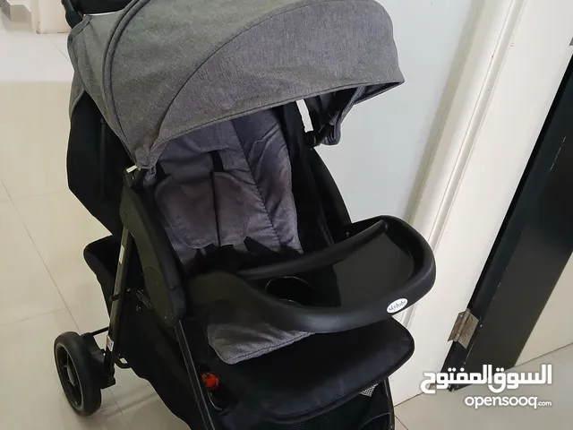 عربة أطفال جديده