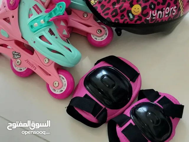 Vibrant Pink Roller Skating Set for Kids - Safety Gear Included!