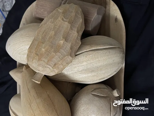 تحف خشب على شكل صحن فواكة