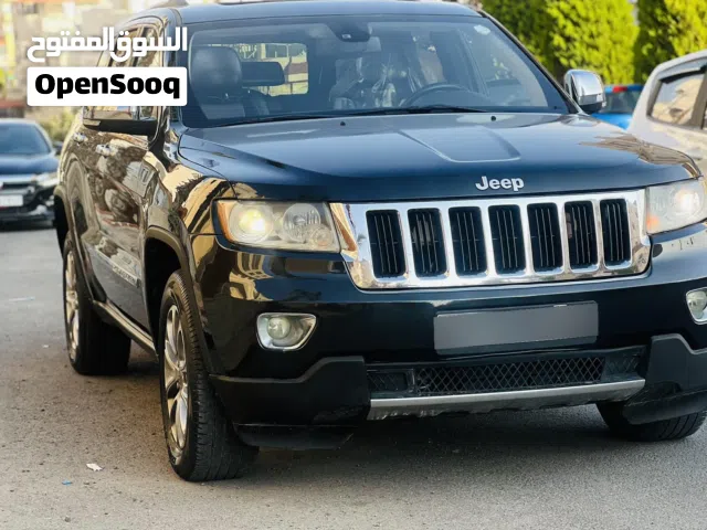 جيب جراند شيروكى 2011 أسود موديل ليمتد مع مواصفات أمريكية  اعلى صنف فل الفل فحص كامل