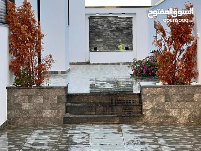 قطعة ارض 500م للبيع بسعر كزيوني ف تاجوراء خلة فارس بالقرب من مسجد العباني