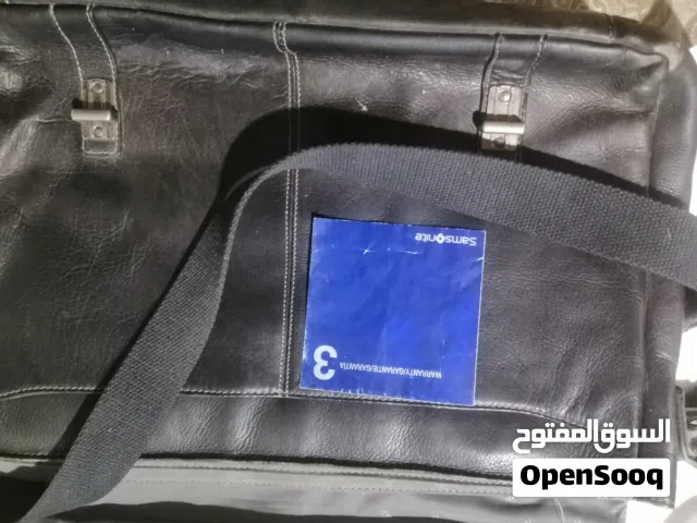 عدد 2شنطه جلد طبيعي ماركات اصليه بحاله ممتازه