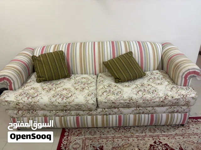 Seven seater sofa with 6 cushions pillows, one teapoy and 4 side tables