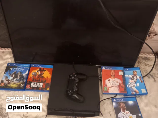 PS4 + TV + video game discs