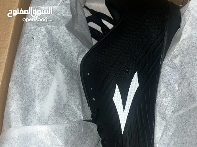 Brand new men’s black football shoes for sale