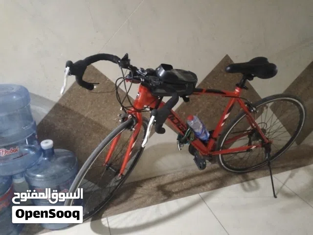 road bike new used for 2 days with light tor wheels color red  location:ajman bustan