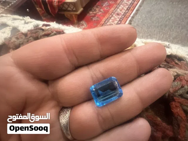 توباز لون سمائي +ياقوت ازرق حجم كبير