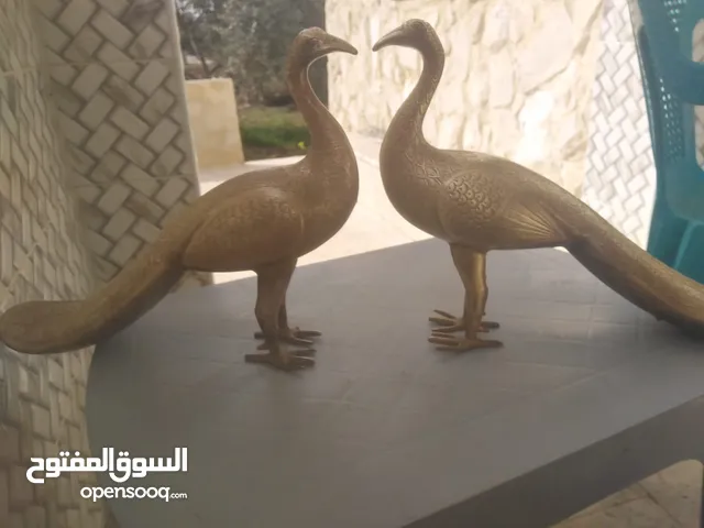 طاووس عدد 2 نحاس اصلي وزن الواحد منهم كيلو ونص للبيع الاثنين ب 65 دينار