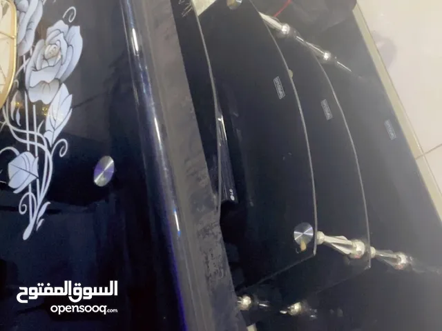 طاولةً تلفزون