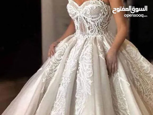 شروة بدل زفاف ابيض وملون