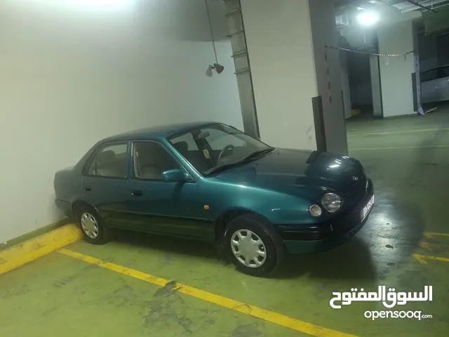 تويوتا كورولا موديل1999 لون تركواز