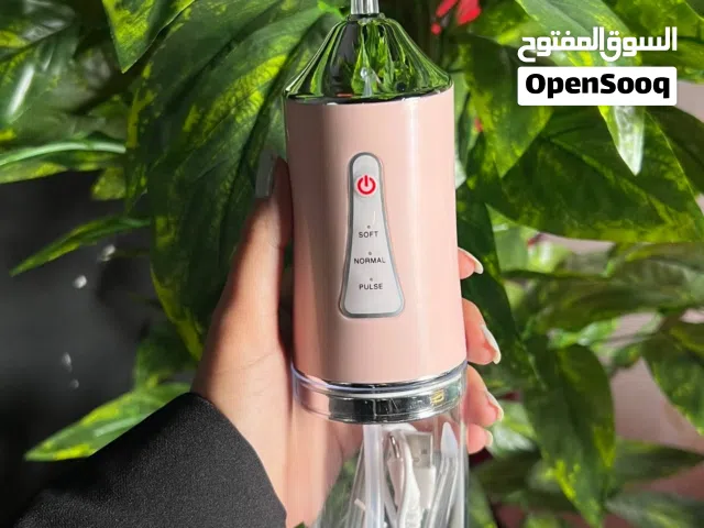جهاز تنظيف الاسنان المائي