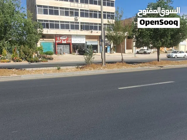 ارض مع مجمع تجاري