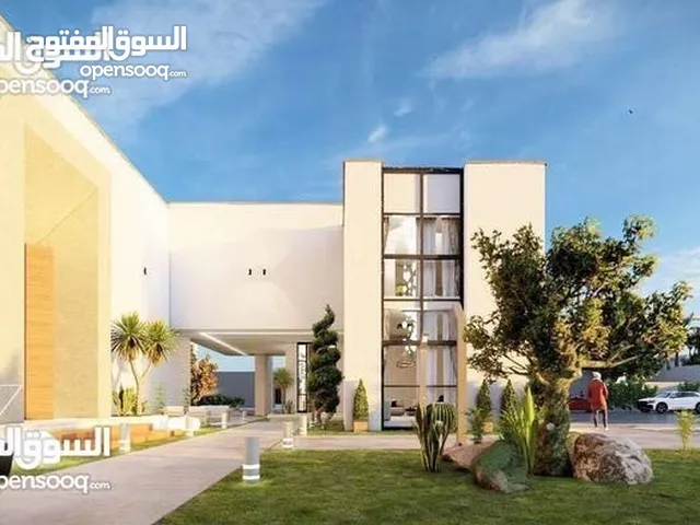 مبنئ تجاري للبيع - الحشان - بالقرب من سيمافور بالحاج ومسجد لفرحات موقع تجاري ممتاز ومساحة أرض 290 م