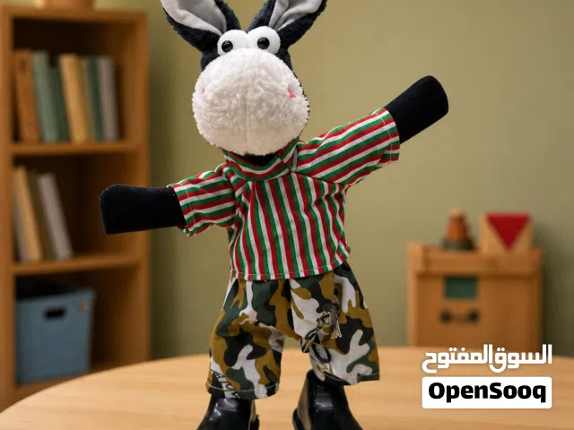 لعبة الحمار الراقص بتصميم لطيف وملابس مميزة، تضيف جو حلو للبيت وتناسب الهدايا والأطفال