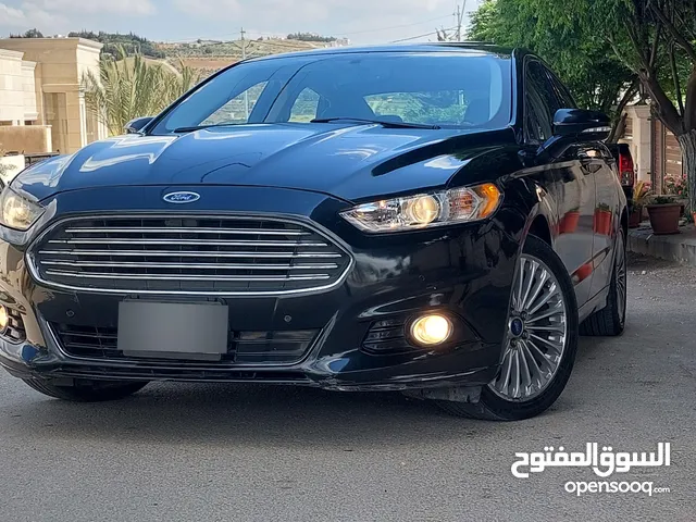 فورد فيوجن 2014 هايبرد تيتانيوم فل اضافات ماشيه 70 الف فقط بحاله الشركة