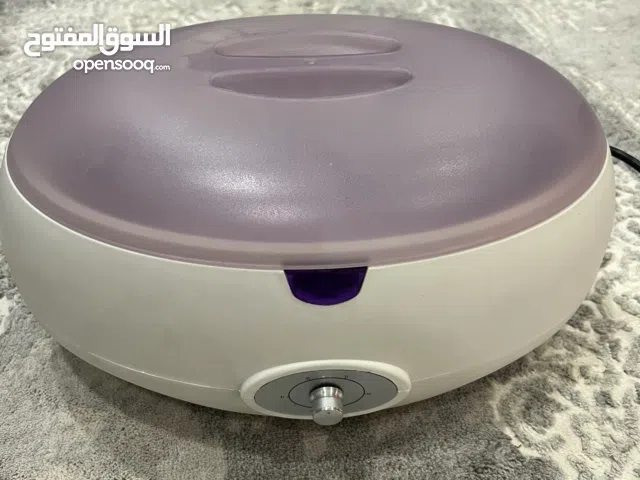 جهاز شمع برافين لتنعيم اليديدن والارجل ،، غير مستخدم ،،