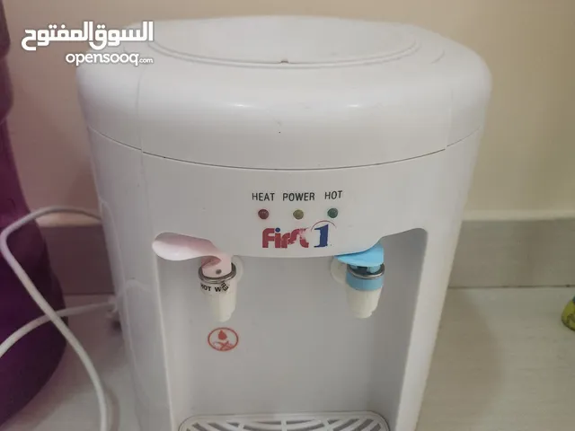 water dispenser (the blue is room temperature, the red is hot water) no cooling system